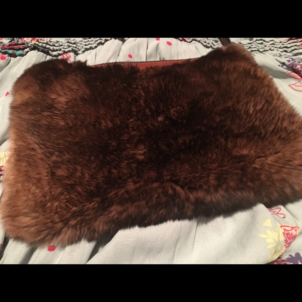 All leather and fur oversized wristlet